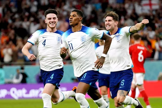 Marcus Rashford celebrates scoring for England at the World Cup in Qatar (Adam Davy/PA).