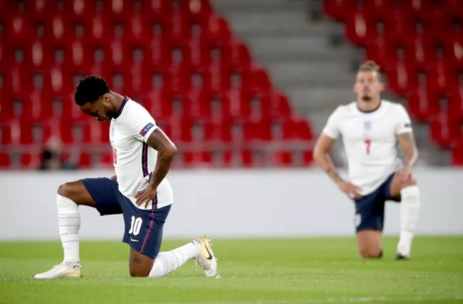 England stars taking a knee