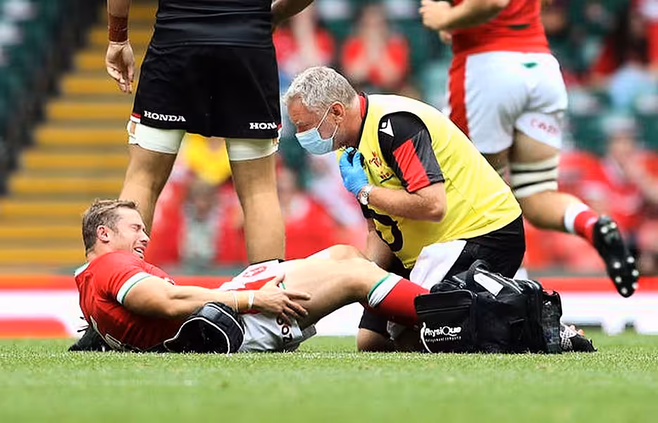 Leigh Halfpenny receives treatment for an injury