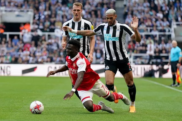 Newcastle's Joelinton, right, received racist abuse following last month's defeat to Arsenal