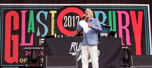 Labour leader Jeremy Corbyn speaks to the crowd from the Pyramid stage at Glastonbury in 2017