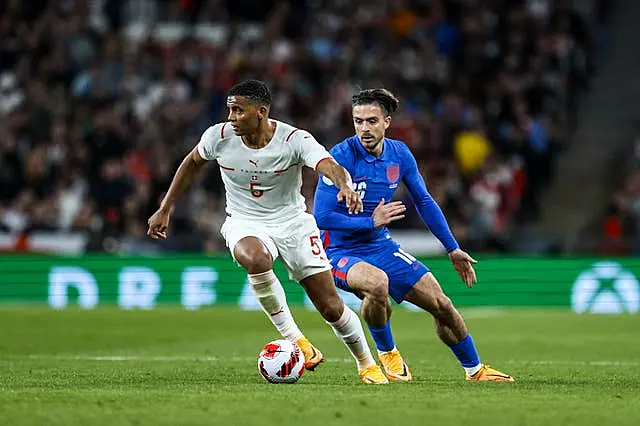 Manuel Akanji (left) is in Manchester City's sights