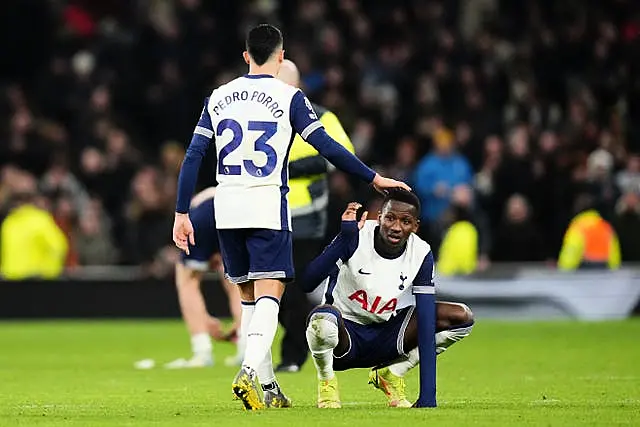 Pape Matar Sarr (right) is consoled by Pedro Porro