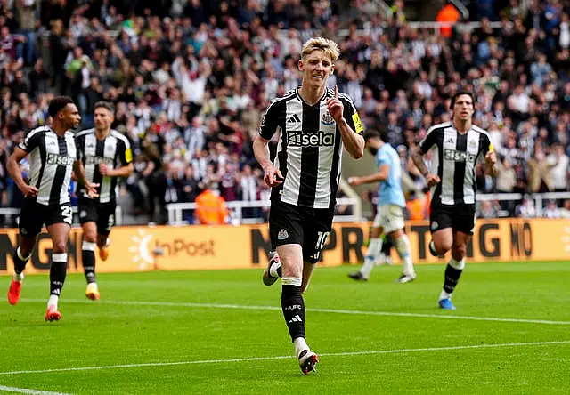 Newcastle’s Anthony Gordon celebrates scoring the equaliser from the penalty spot against Manchester City