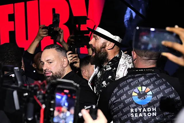 Tyson Fury (centre) threw insults at Oleksandr Usyk towards the end of the face off