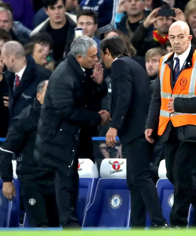 Jose Mourinho has a word with Antonio Conte 