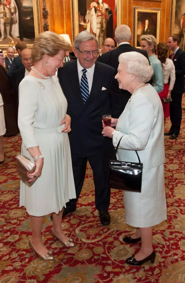 Queen Elizabeth II (right) speaks to Constantine and his wife Anne-Marie at a lunch held in honour of the queen's Diamond Jubilee at Windsor Castle