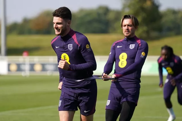 England’s Declan Rice (left) and Jack Grealish during a training session