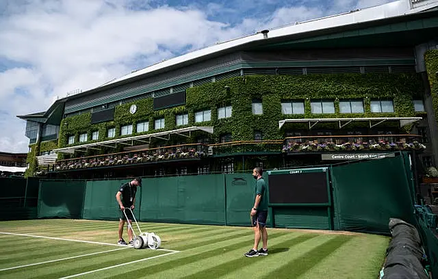 Ground Staff marking the white lines on Middle Sunday in 2021