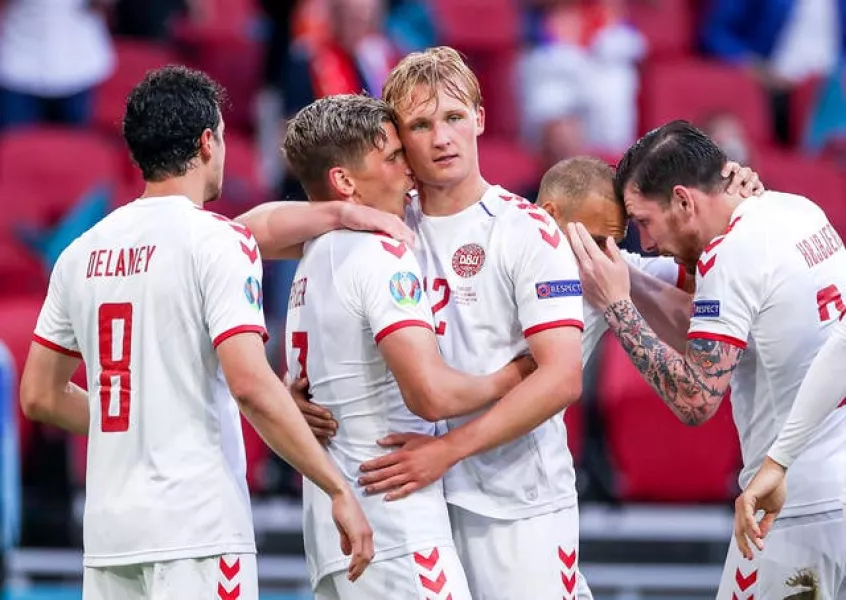 Denmark’s Kasper Dolberg (centre) celebrates scoring against Wales in Euro 2020