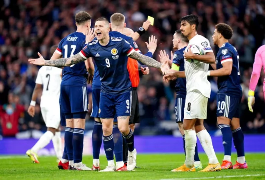 Scotland’s Lyndon Dykes reacts after his goal is disallowed