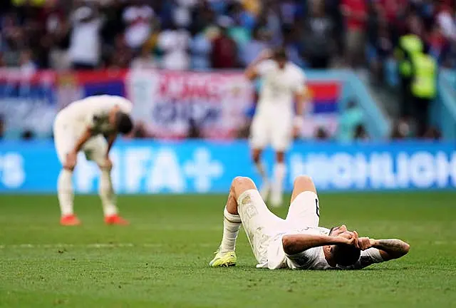 Serbia's Aleksandar Mitrovic is dejected after his side had been pegged back by Group G rivals Cameroon