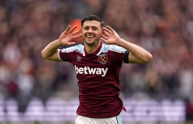 Aaron Cresswell celebrates his goal