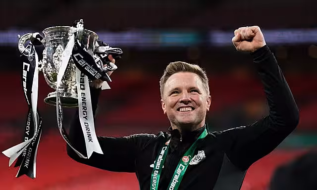 Eddie Howe holding trophy