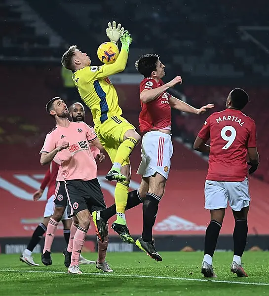 Harry Maguire was adjudged to have fouled Sheffield United goalkeeper Aaron Ramsdale before Anthony Martial found the net