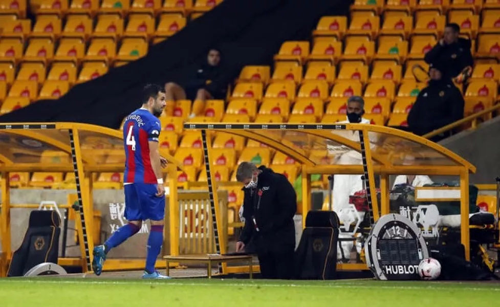 Luka Milivojevic leaves the pitch after being sent off