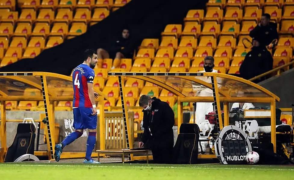 Luka Milivojevic leaves the pitch after being sent off