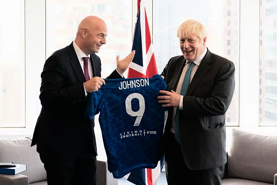 Gianni Infantino, left, pictured with British Prime Minister Boris Johnson