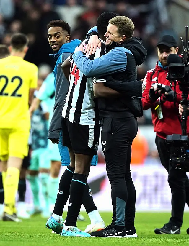 Newcastle striker Alexander Isak (left) celebrates with head coach Eddie Howe following a Premier League victory over Fulham