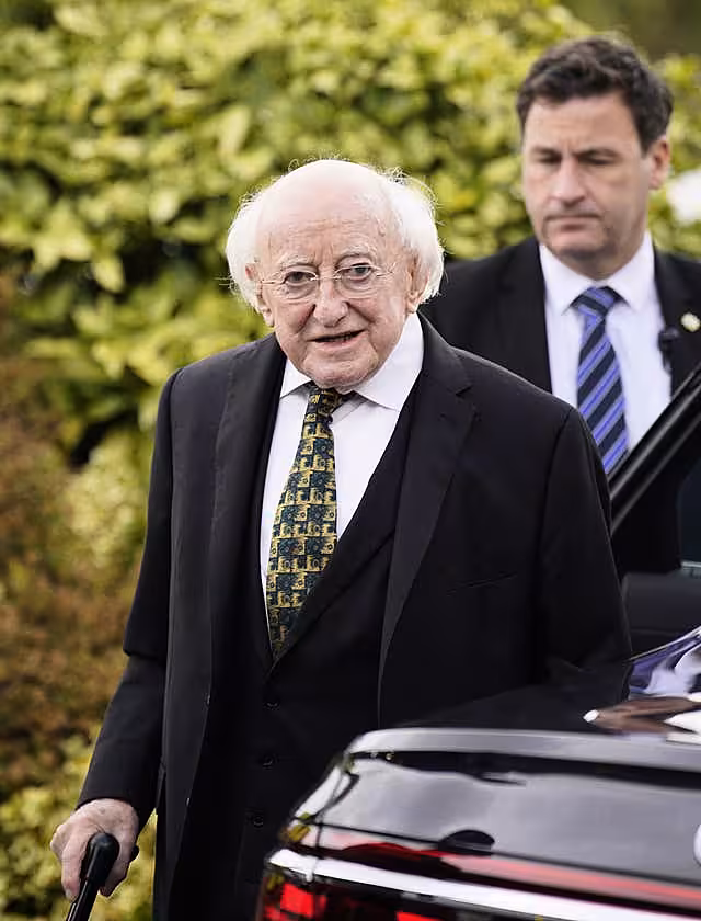 President of Ireland Michael D Higgins arrives for the funeral