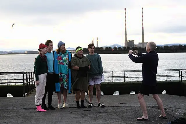 A group of people pose for a photo