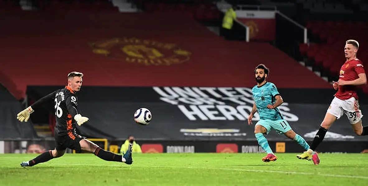 Mohamed Salah scores Liverpool's fourth goal at Old Trafford last season