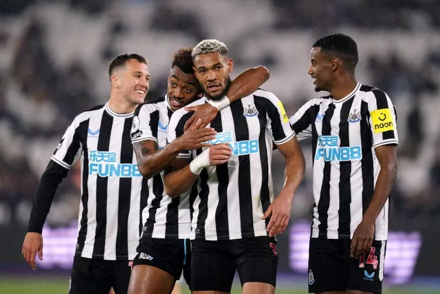 Joelinton (centre) celebrates a goal for Newcastle