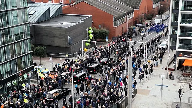 The funeral procession of Shane MacGowan after crossing Mac Mahon Bridge in Dublin