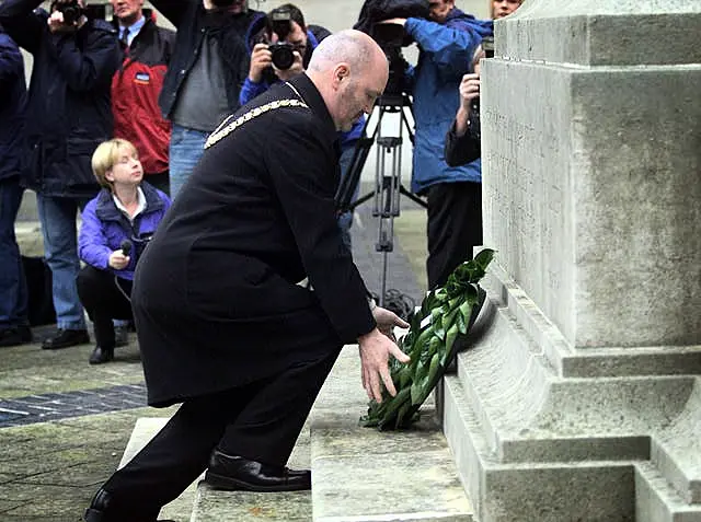 Alex Maskey lays wreath in Belfast