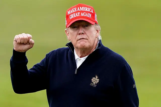 Former US president Donald Trump playing golf at Turnberry golf course during his visit to the UK in May 2023