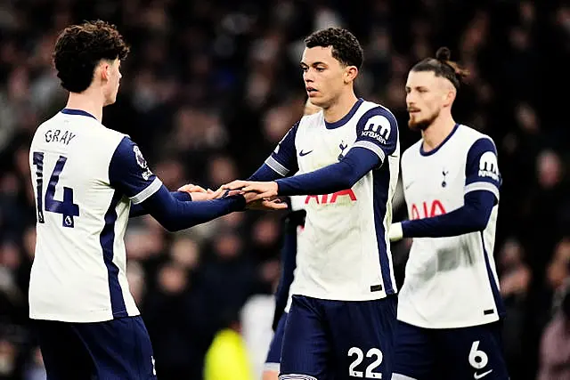 Brennan Johnson (centre) celebrates putting Tottenham ahead