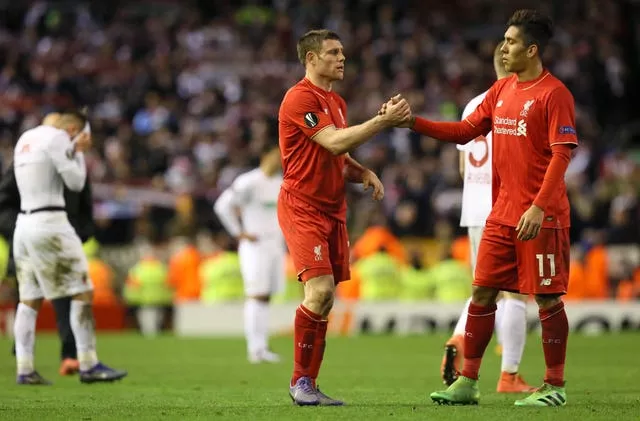 James Milner and Roberto Firmino