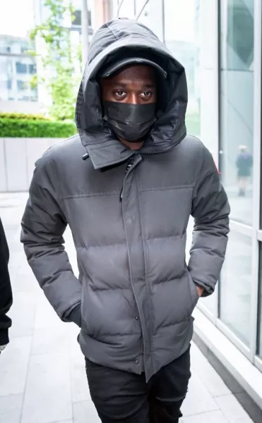 Manchester United defender Aaron Wan-Bissaka leaving Manchester Magistrates' Court in September 