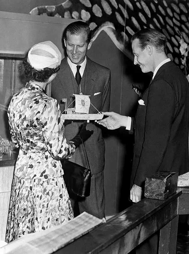 The late Queen Elizabeth II is presented with a model of the raft by Thor Heyerdahl in the 1940s