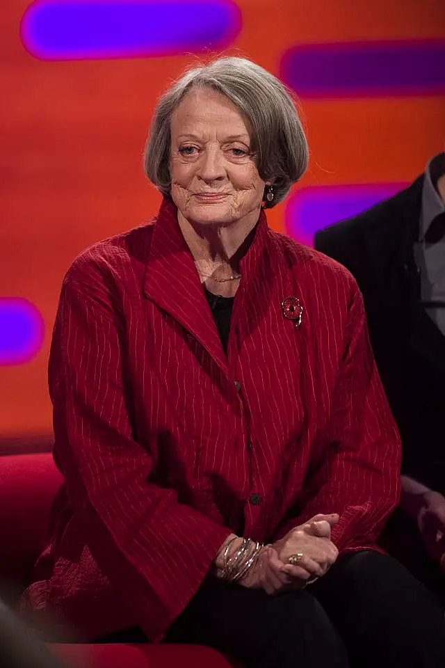 Dame Maggie Smith in red