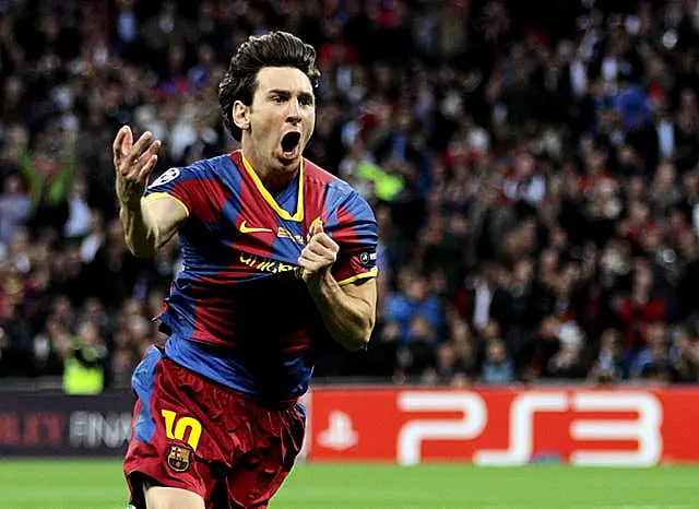 Lionel Messi celebrates scoring for Barcelona