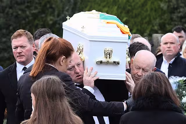 The coffin of Ronan Wilson is carried into St Mary’s Church, Dunamore, for his funeral