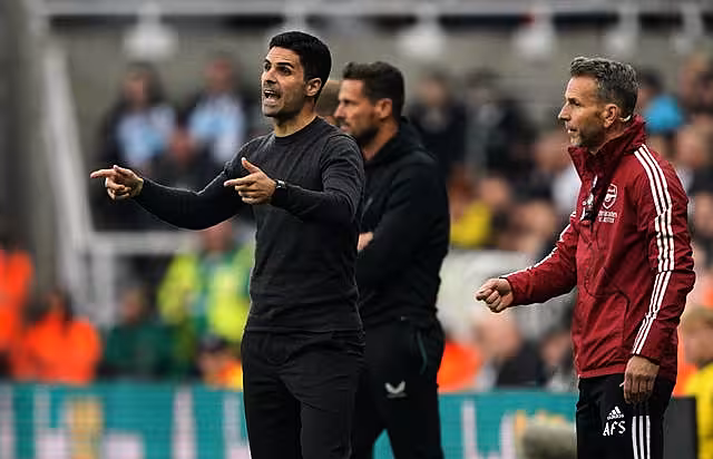 Arsenal manager Mikel Arteta watches on