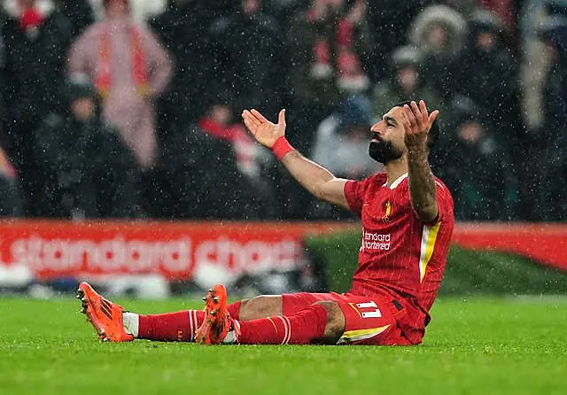 Mohamed Salah celebrates scoring Liverpool’s second goal from a penalty