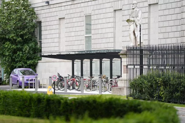 View of bikes under a bike shelter