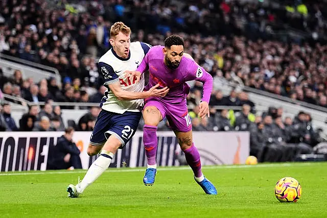 Tottenham Hotspur’s Dejan Kulusevski (left) and Wolverhampton Wanderers’ Matheus Cunha battle for the ball 