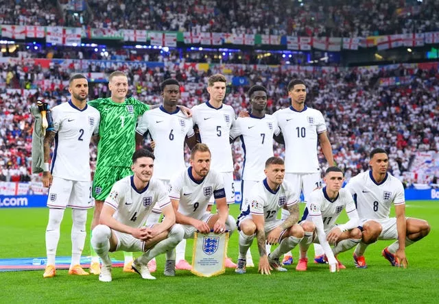 The England team lines up ahead of the Serbia clash