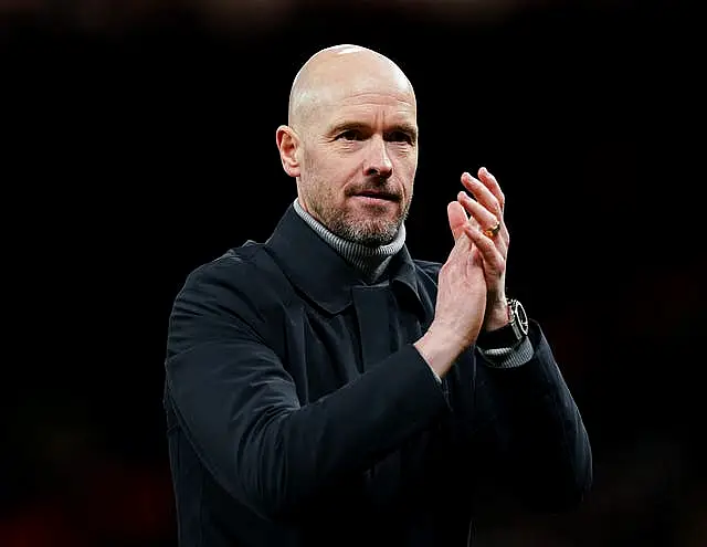 Erik Ten Hag applauds from the touchline