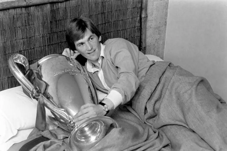  Kenny Dalglish in bed with the European Cup trophy in 1978