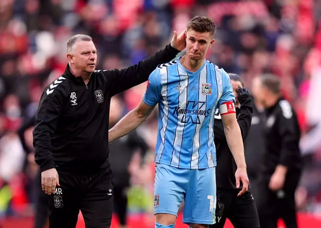 Coventry manager Mark Robins consoles Ben Sheaf 