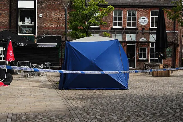 A police tent at the scene on Railway Street in Altrincham, Trafford, 