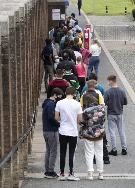 People queuing at a vaccination centre in Dublin (Damien Eagers/PA)