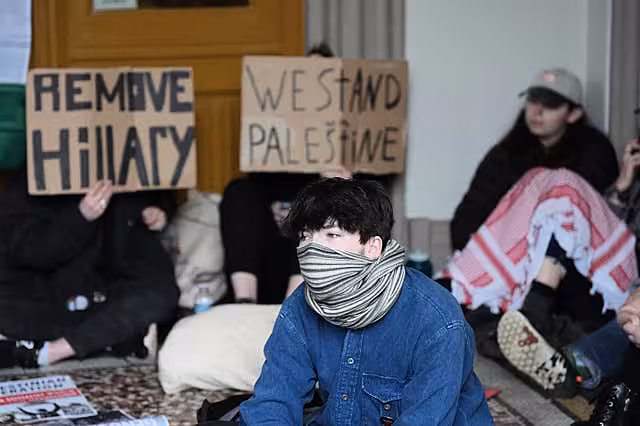 Members of the Queen’s University Belfast (QUB) Palestine Assembly hold a ‘sit in’ in the main Lanyon building of the campus
