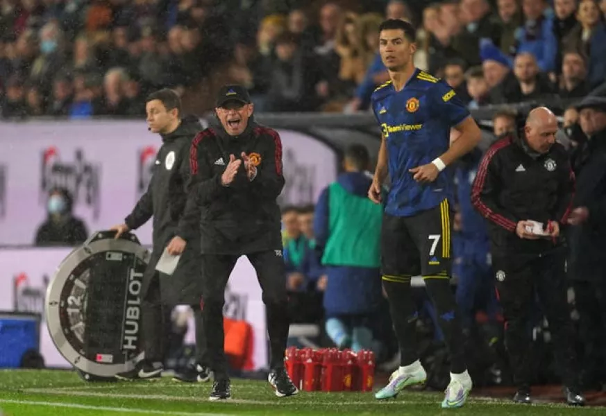 Manchester United manager Ralf Rangnick reacts on the touchline as substitute Cristiano Ronaldo prepares to enter the game at Burnley