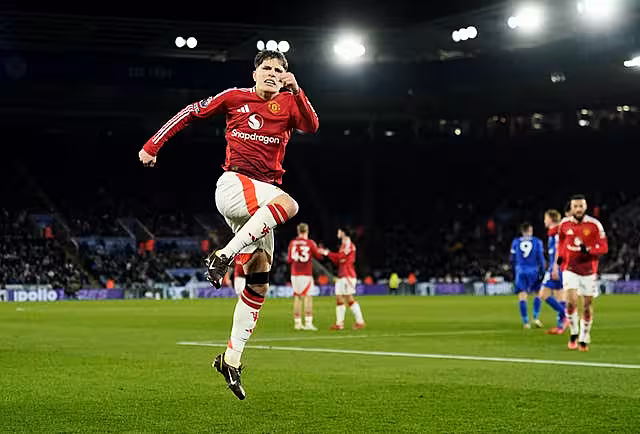 Alejandro Garnacho celebrates by jumping in the air